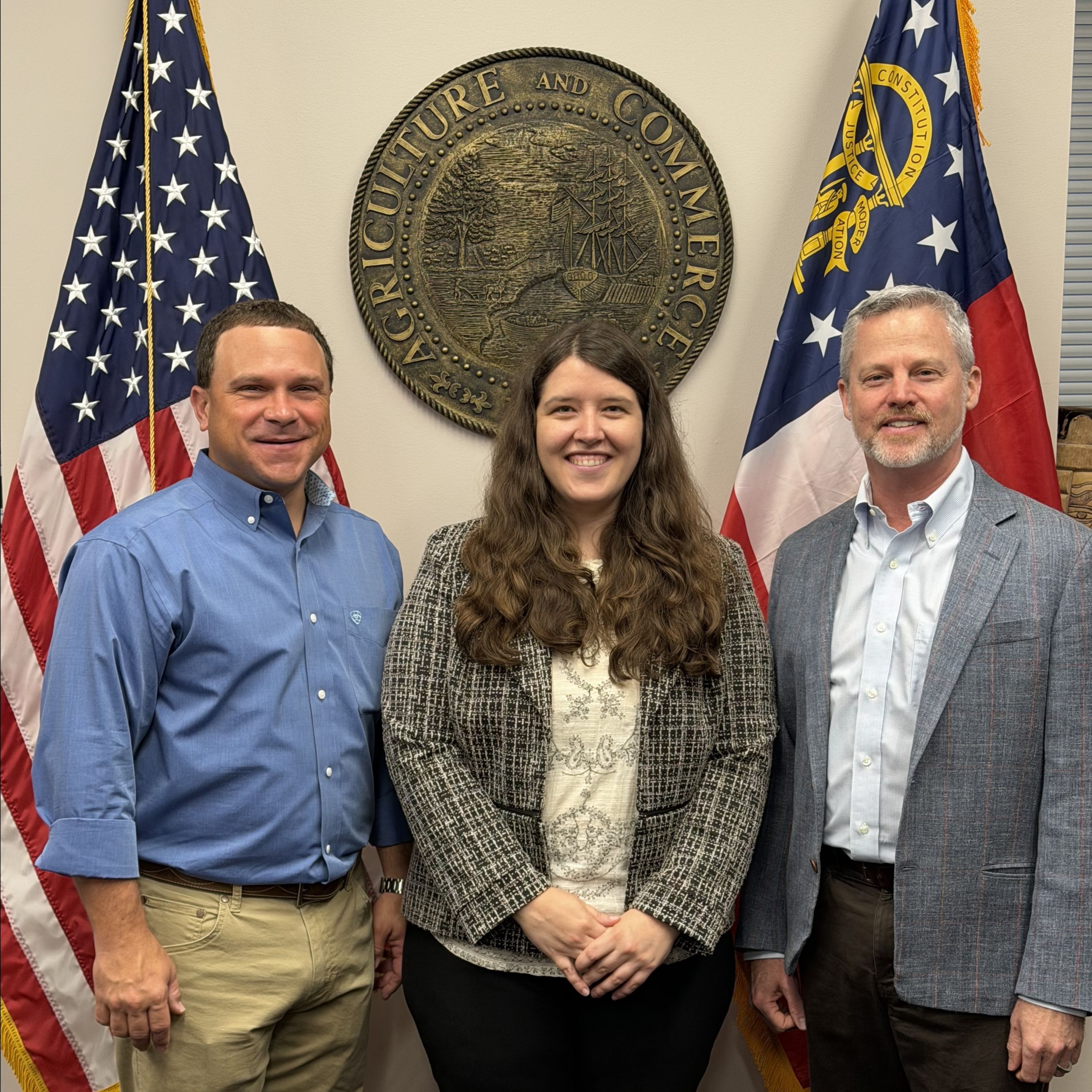 Georgia Agriculture Commissioner Tyler J Harper, Ali Ikner, and Derrick Lastinger following Ikner's swearing-in as the Commissioner's designee to the Georgia Structural Pest Control Commission. (Photo by the Georgia Department of Agriculture)