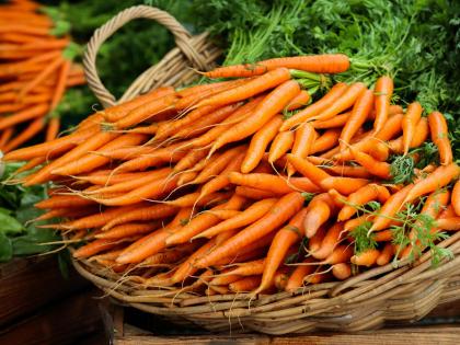Bunches of Carrots in Baskets